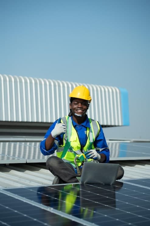 Solar engineer charging solar panel installation equipment