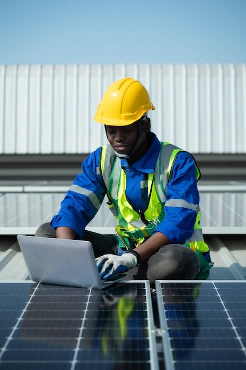 Solar panel installation engineer at work site